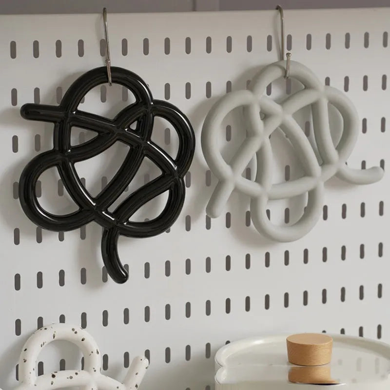 Ceramic heat proof mat in irregular shape with modern solid colour design for table protection