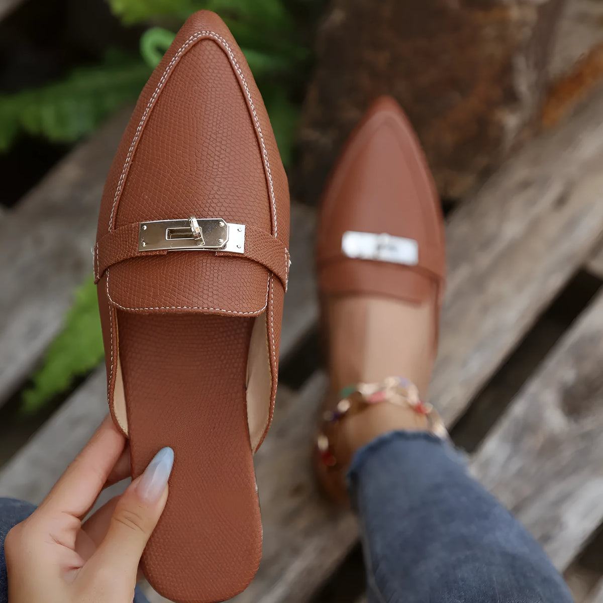 Light brown women's pointed-toe semi-slippers with a low heel and rubber sole.