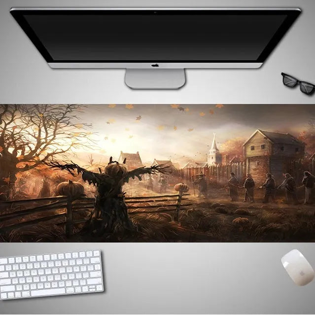 Oversized Halloween-themed rubber cloth mouse pad with non-slip base on a desk.