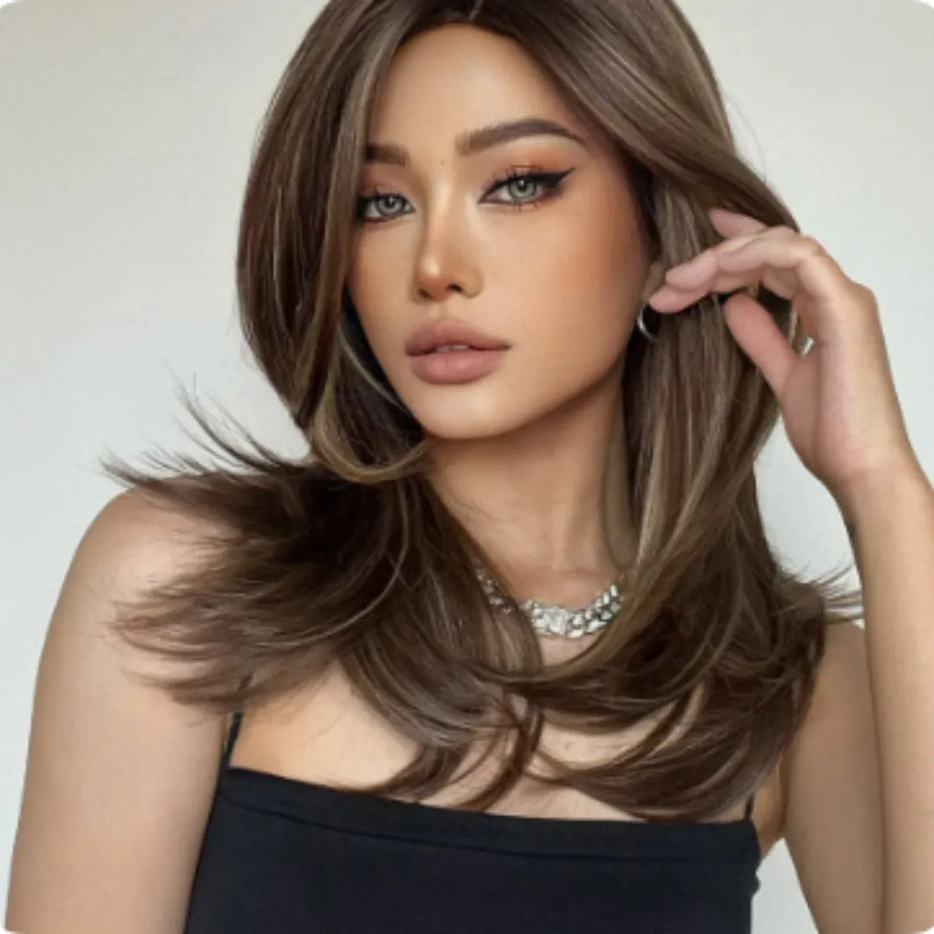 Mid-length curly synthetic wig with long fringe in a platinum gradient colour, available in brown, white gold and wine red.
