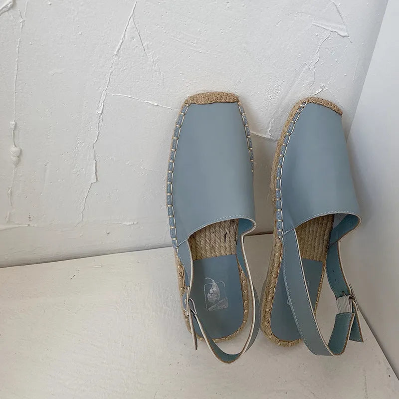 Women's canvas flat sandals with leather accents in retro fisherman style with animal print