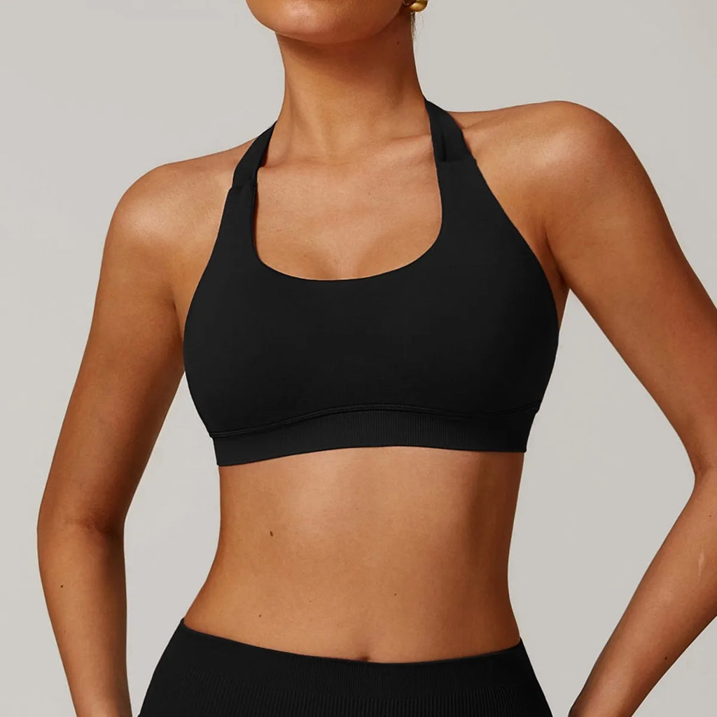 Women's halter neck yoga sports bra in nylon fabric with medium support