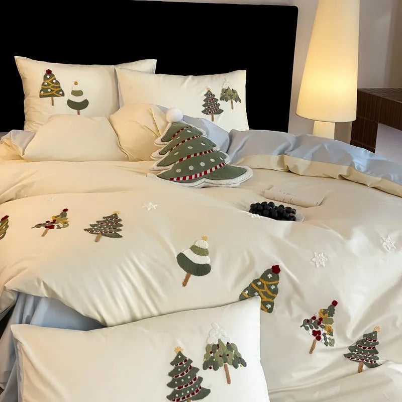 Pure cotton bedding set with Christmas tree embroidery showing duvet cover, sheet, and pillowcases