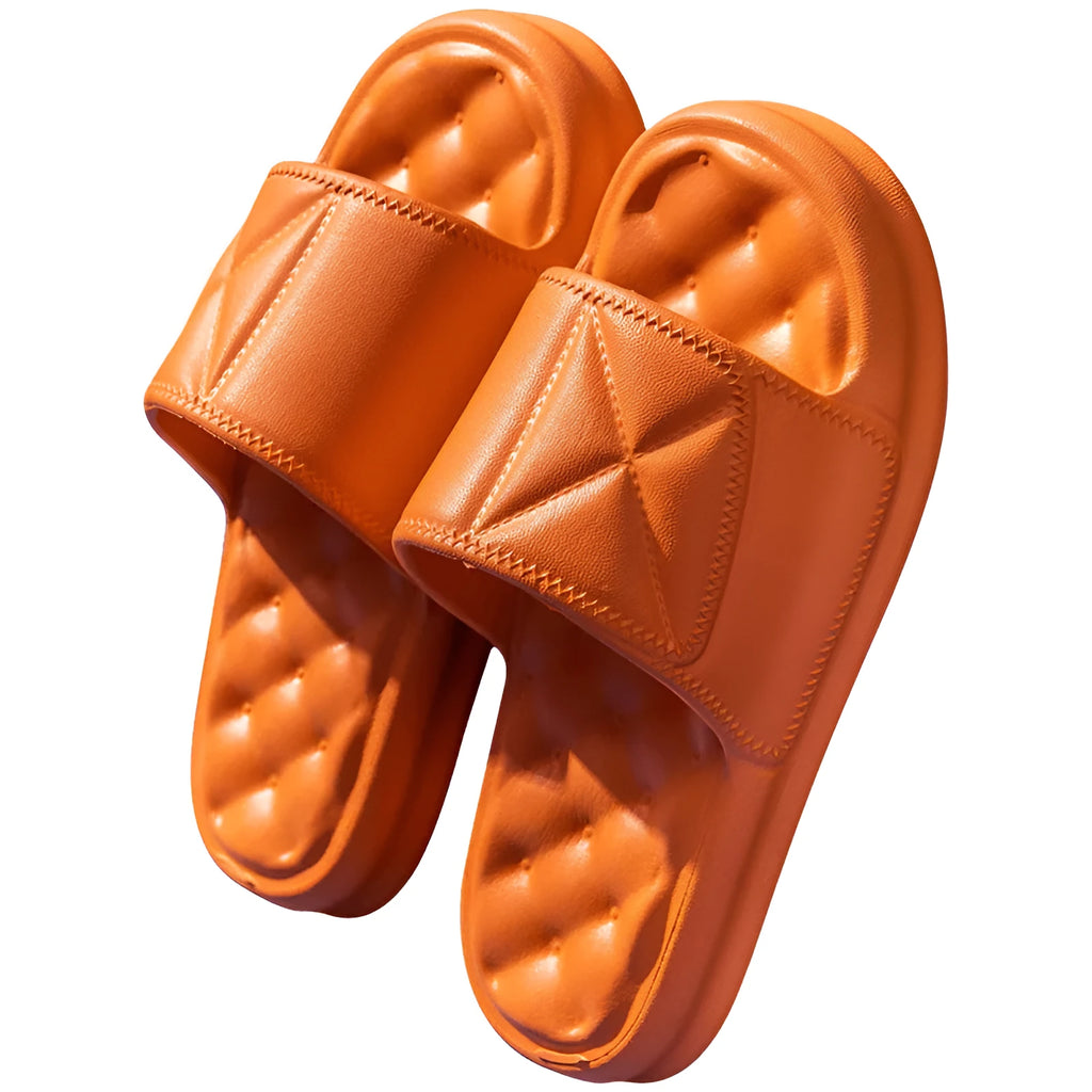 A pair of thick-soled EVA bathroom slippers in a chosen colour, showing the non-slip sole pattern.