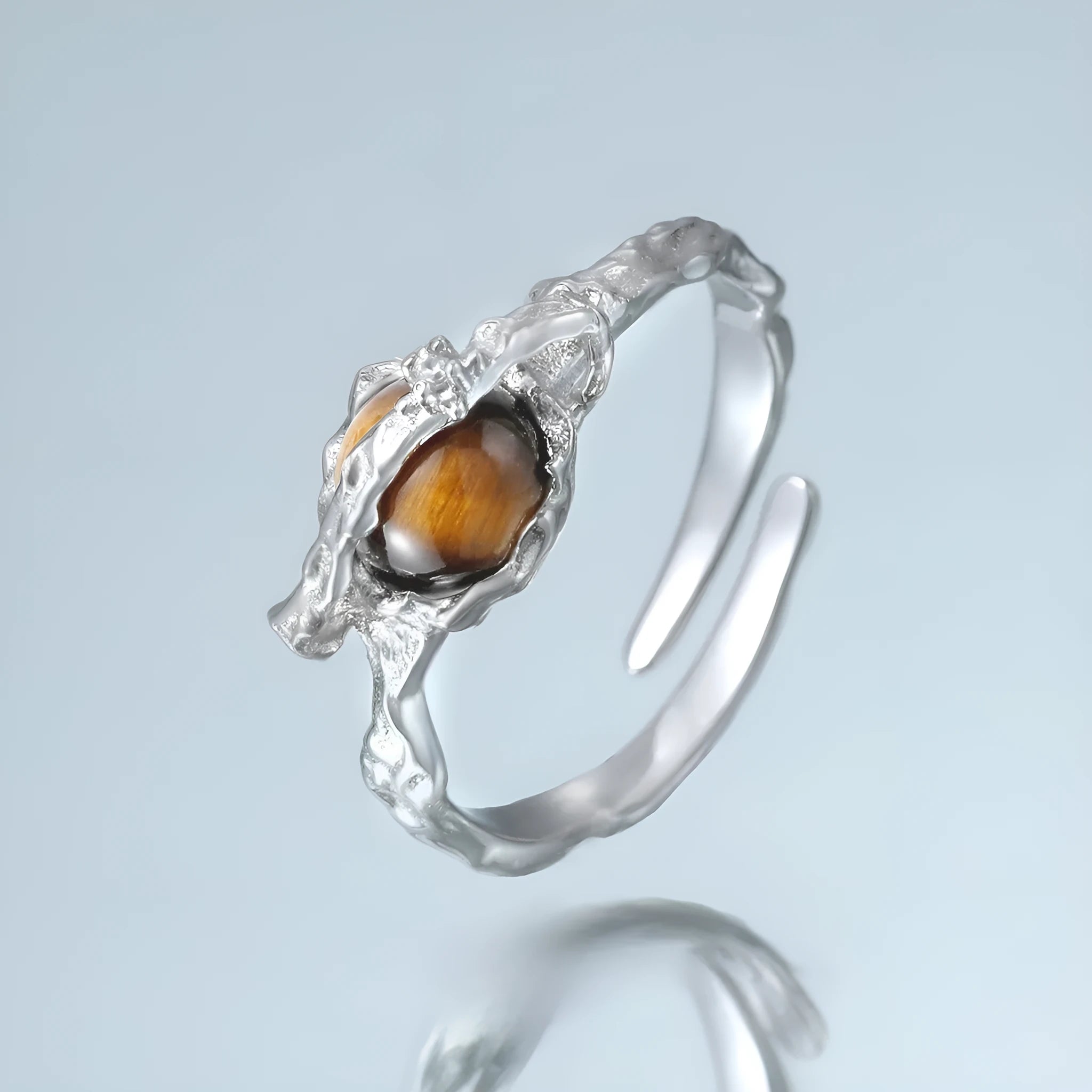 Adjustable opening women's ring with Saturn design in white gold colour electroplated silver