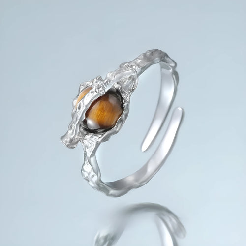 Adjustable opening women's ring with Saturn design in white gold colour electroplated silver
