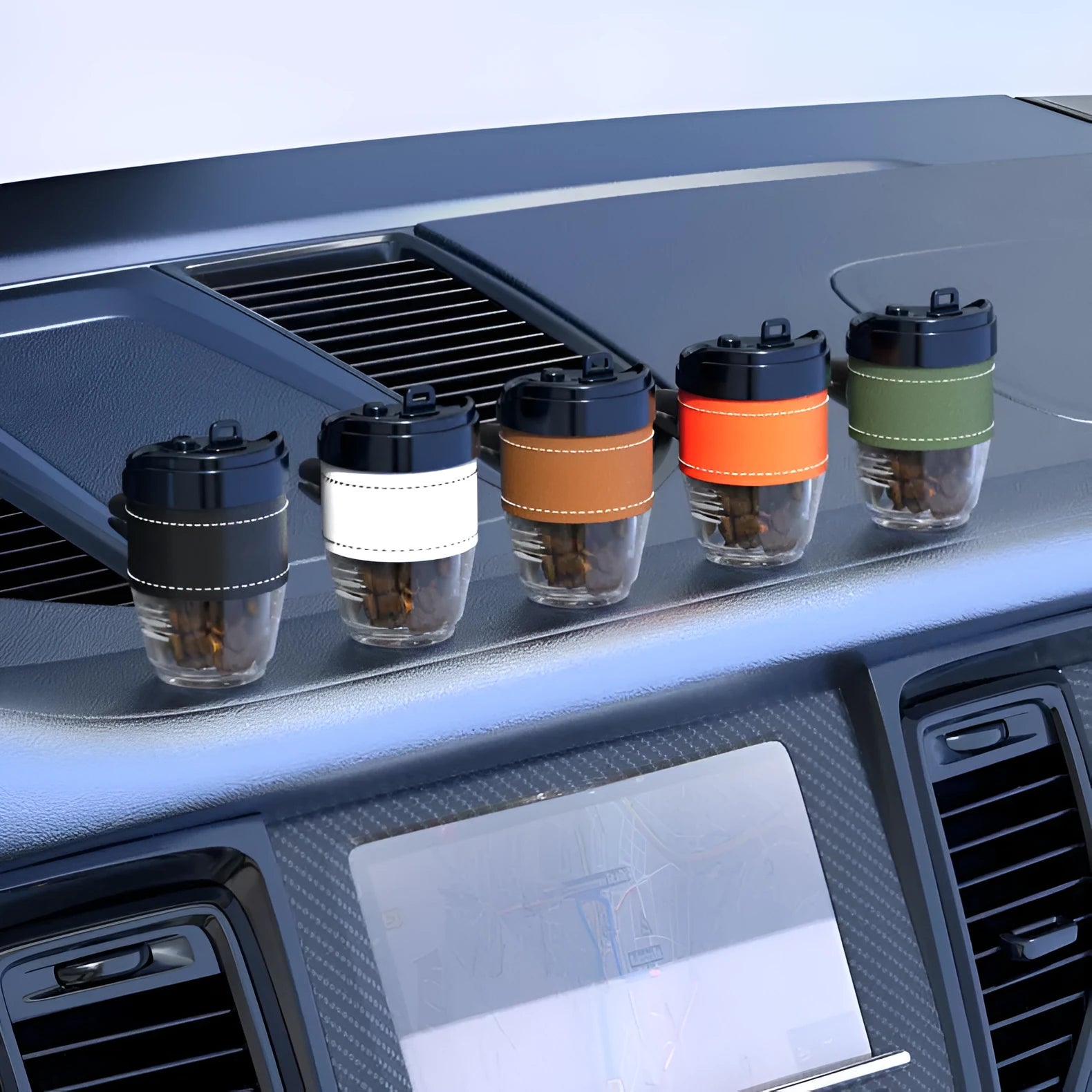 Coffee cup shaped plastic car air freshener in choice of five colours for vehicle odour removal.