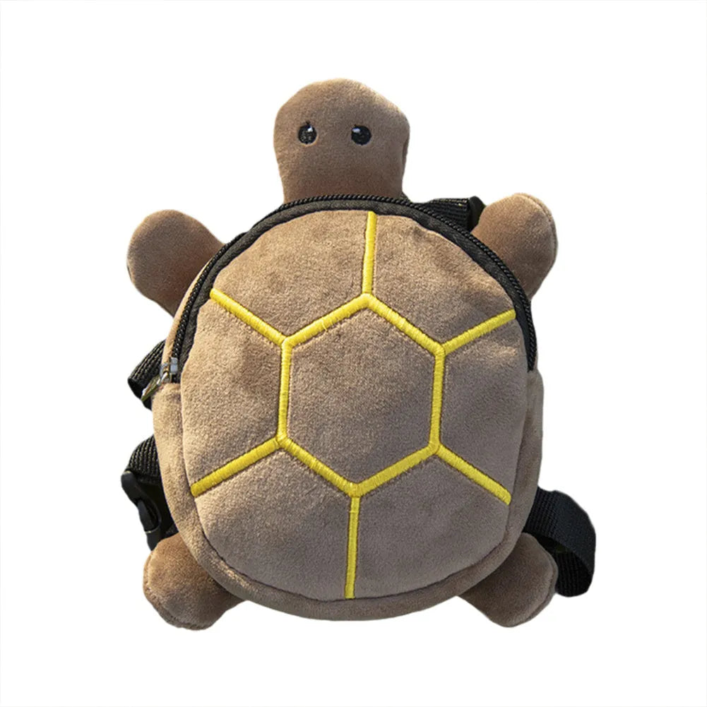 Brown velvet turtle-shaped dog harness with integrated backpack and front metal zipper.