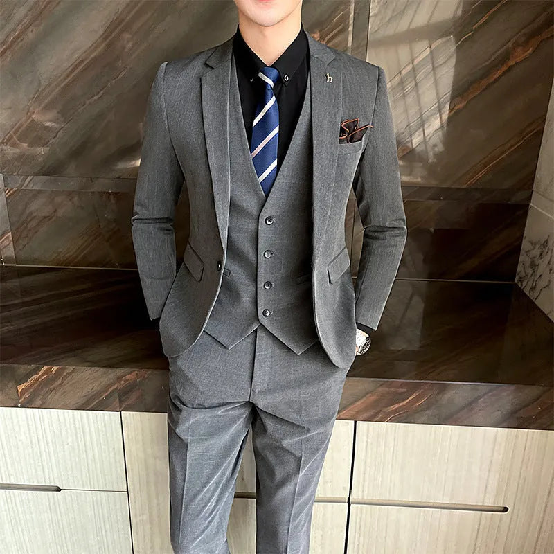 Men's slim fit British style suit in cotton blend fabric available in black and dark grey colours