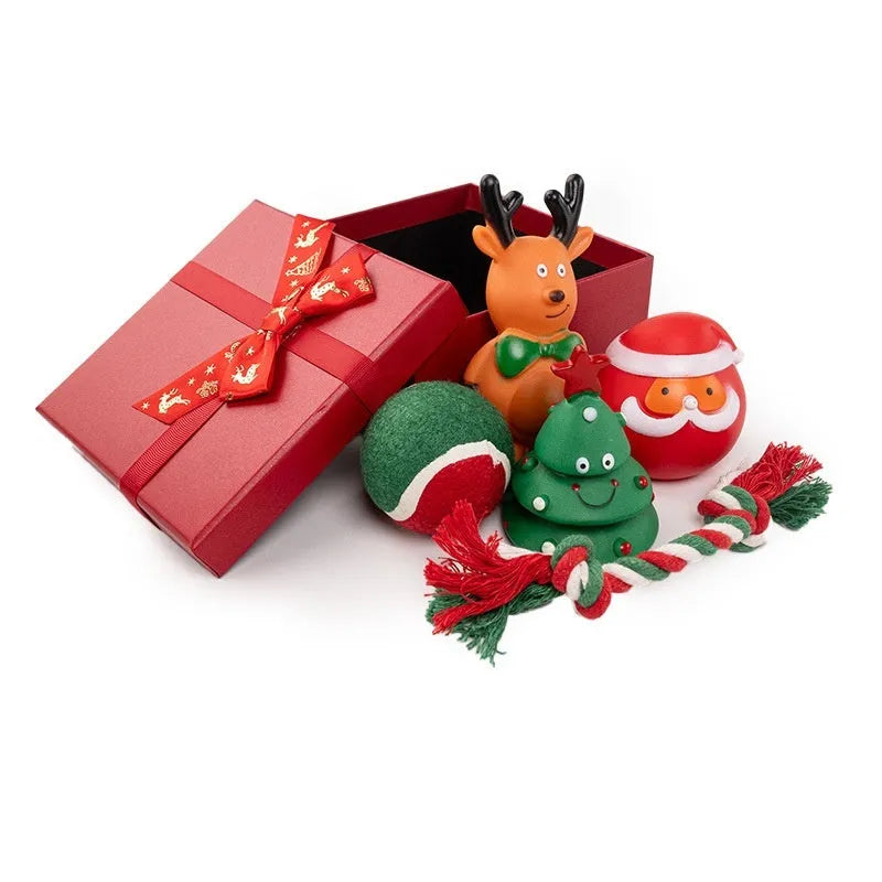 Christmas dog chew toys set with vinyl Santa heads, trees, and festive shapes in gift packaging