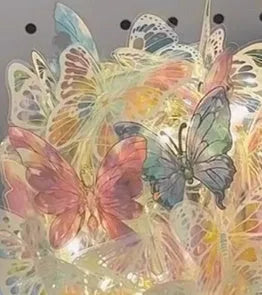 Butterfly-themed DIY night light with glass lampshade on a raw wood base.