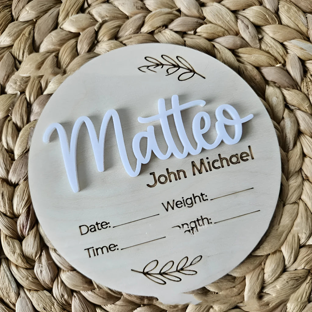 Square wooden baby name sign with engraved birth details including name, date, time, weight, and length.