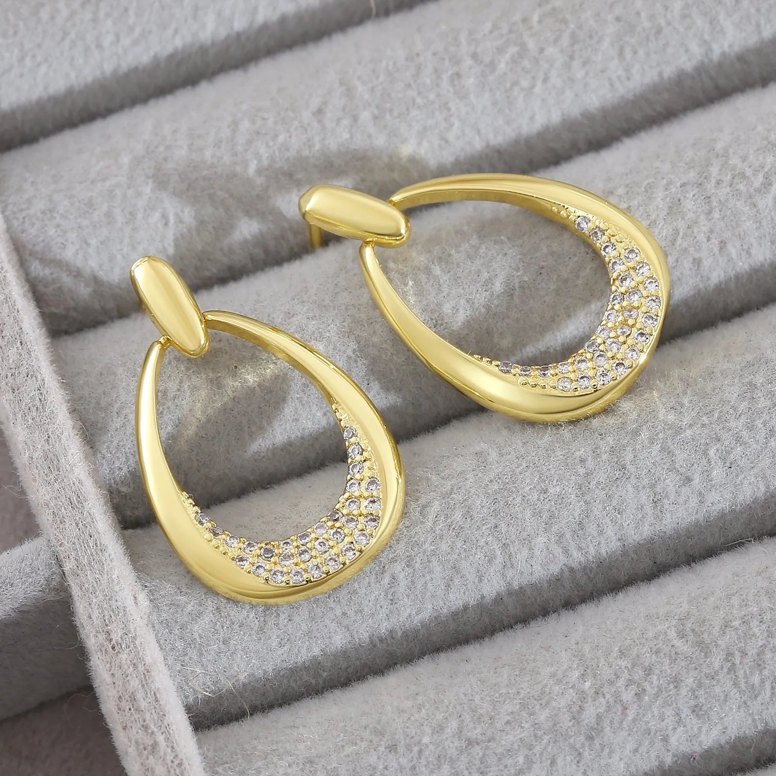 Women's copper geometric drop earrings with zircon details and electroplated yellow gold finish