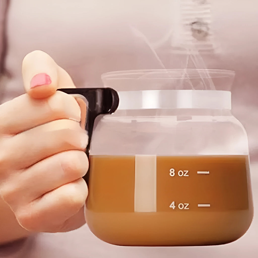 Transparent borosilicate glass coffee maker with silicone cover showing 355-473ml capacity