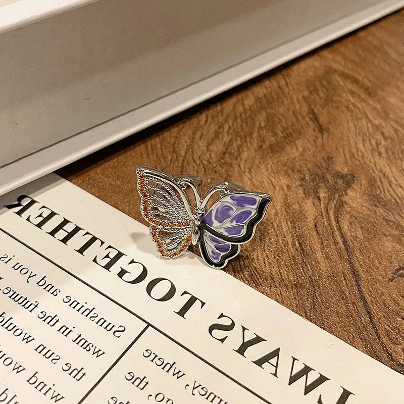 Butterfly women's copper ring with adjustable split ring design showing oil-drip colour treatment