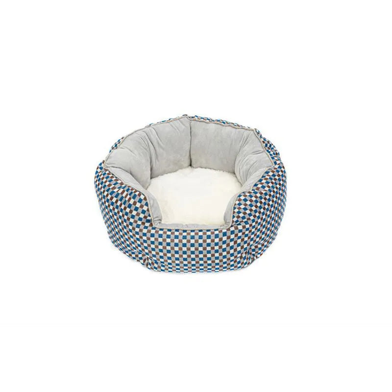 Blue octagonal pet bed for small dog with high sides and removable interior mat.
