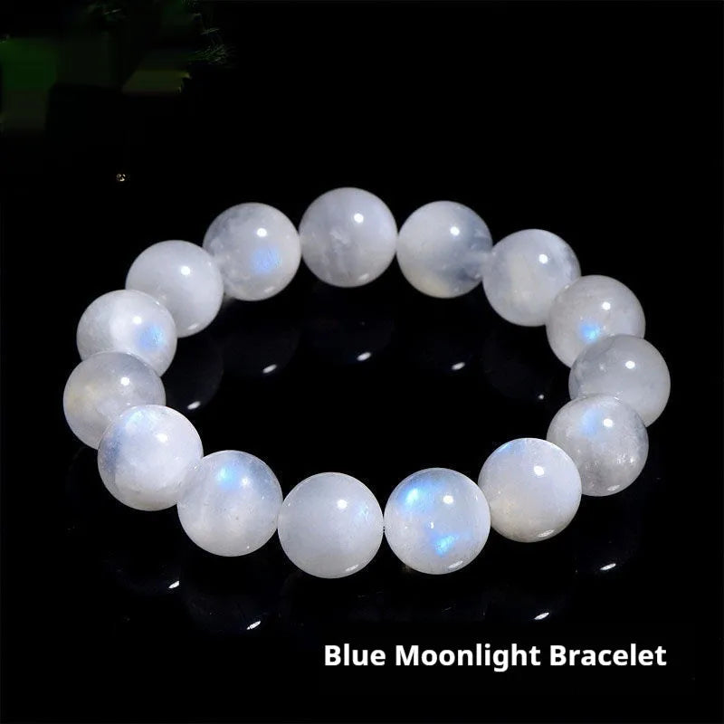 Natural white moonstone round bead bracelet showing blue moonlight sheen and polished surface