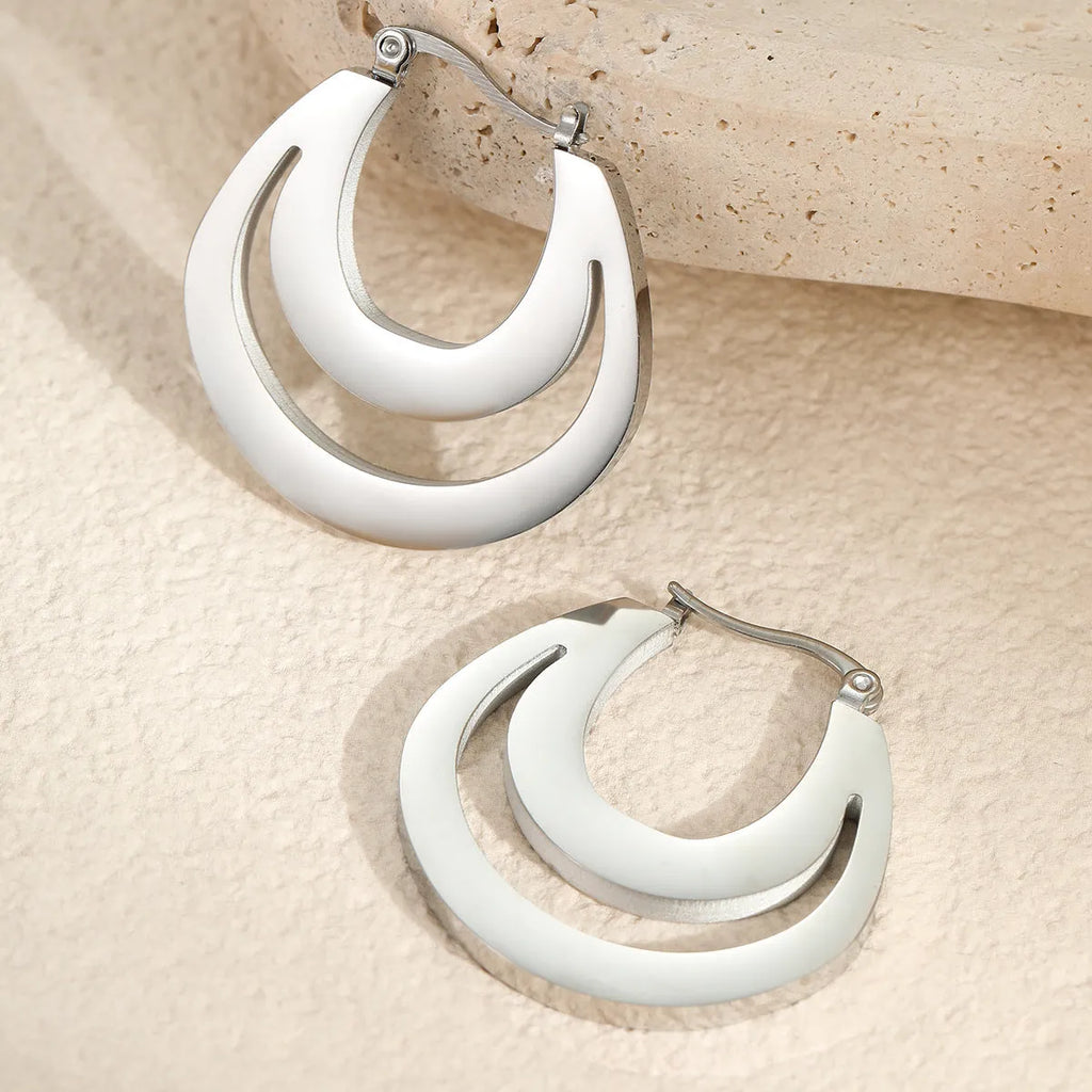 Geometric French earrings with stainless steel construction and 18K gold plating in minimalist design