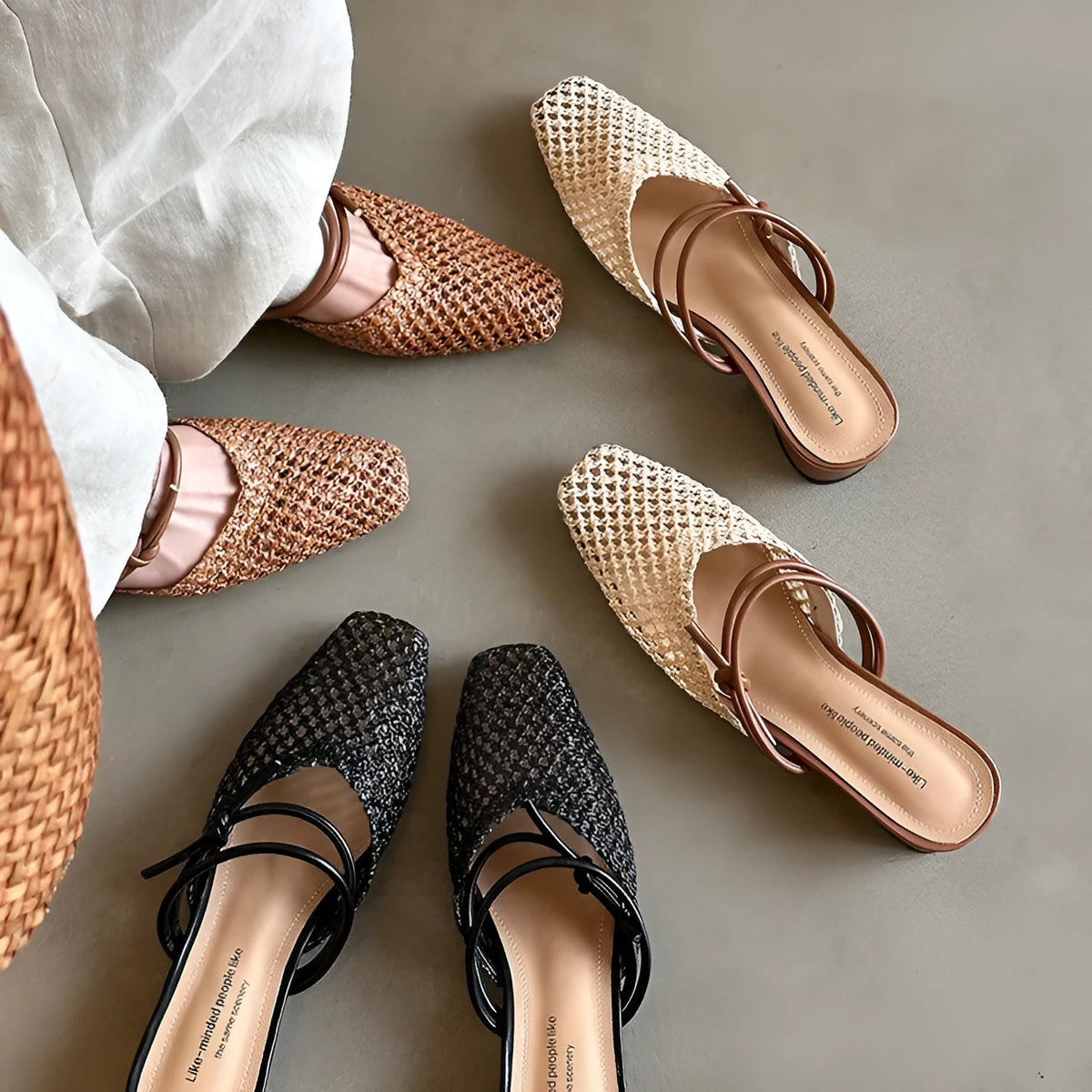 Women's black French-style outdoor slippers with hollow-out design and a thick square chunky heel.
