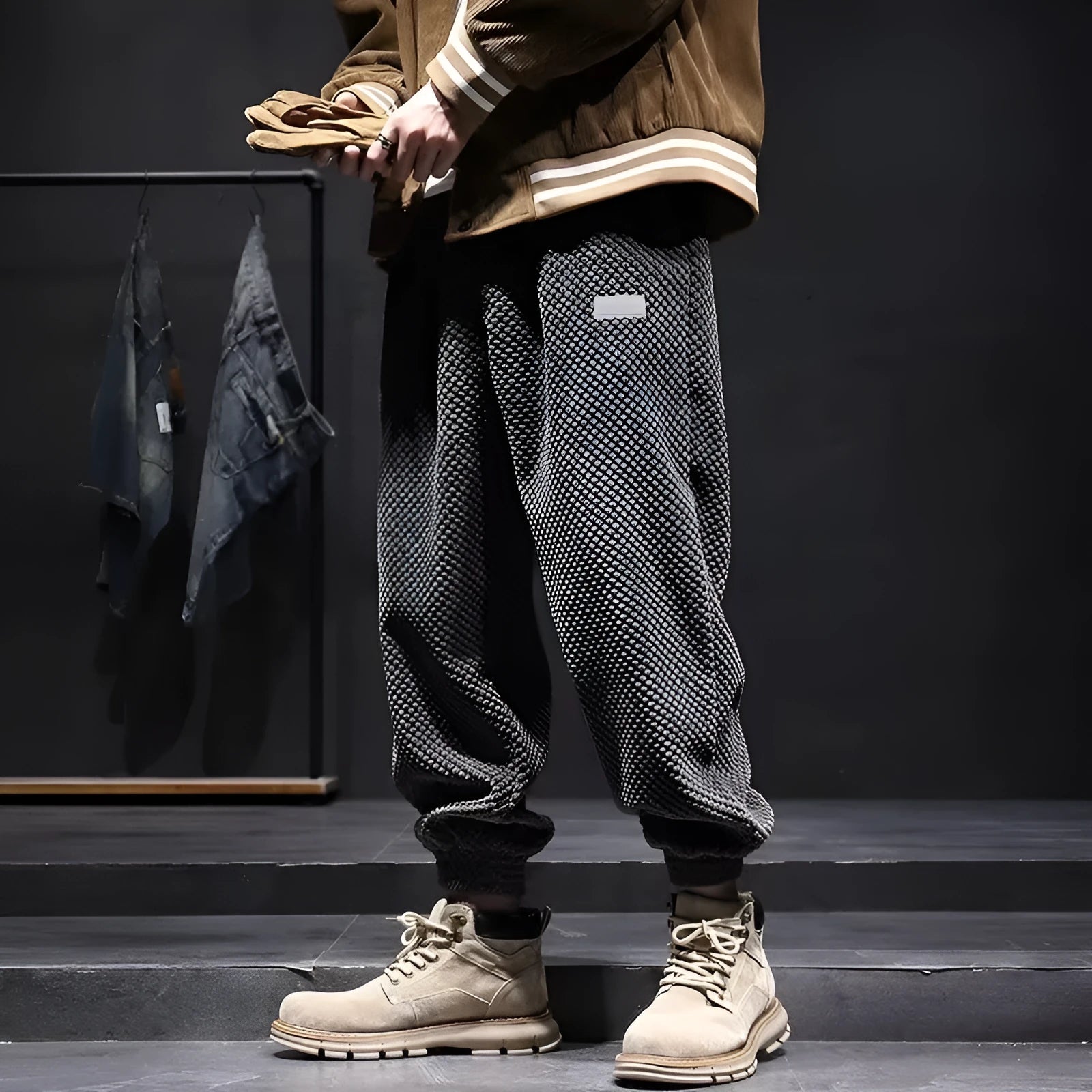 Men's grey casual sweatpants with an ankle tie and straight-leg fit.