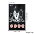 Set of 24 short almond coffin shaped press-on nails with black French tips on a white base.