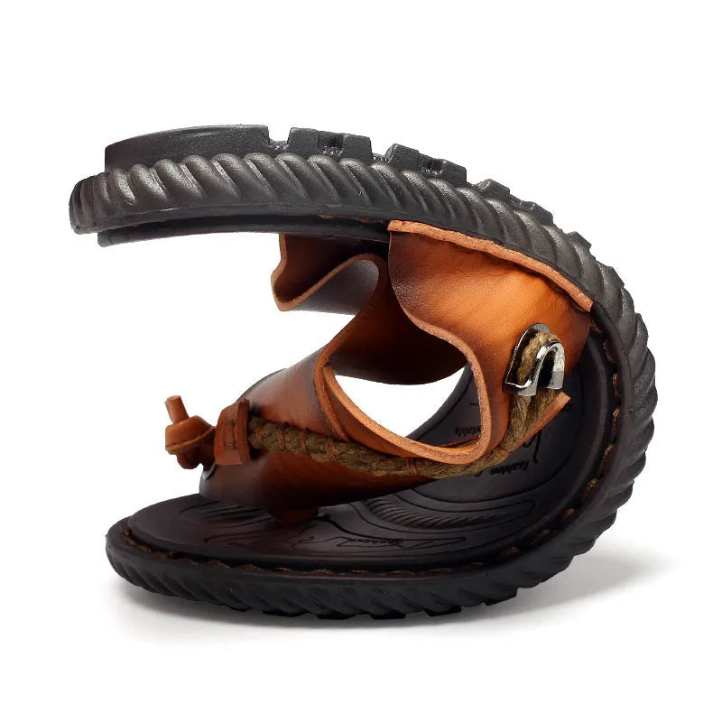 Men's dark blue herringbone pattern outdoor slippers with leather lining and rubber sole, shown in a large size