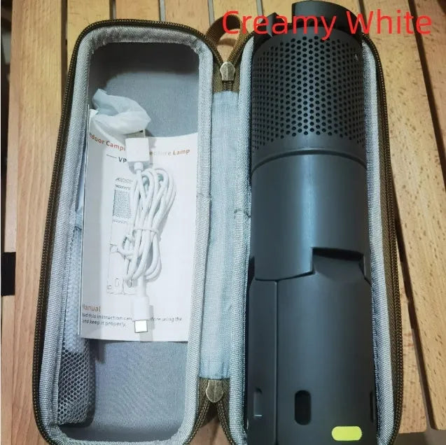Portable LED camping lantern in off white or dark grey colour with battery compartment and button switch