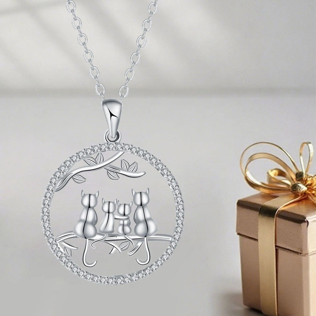 Copper Four Kitten Necklace with cat charm pendant on a cross chain for women.