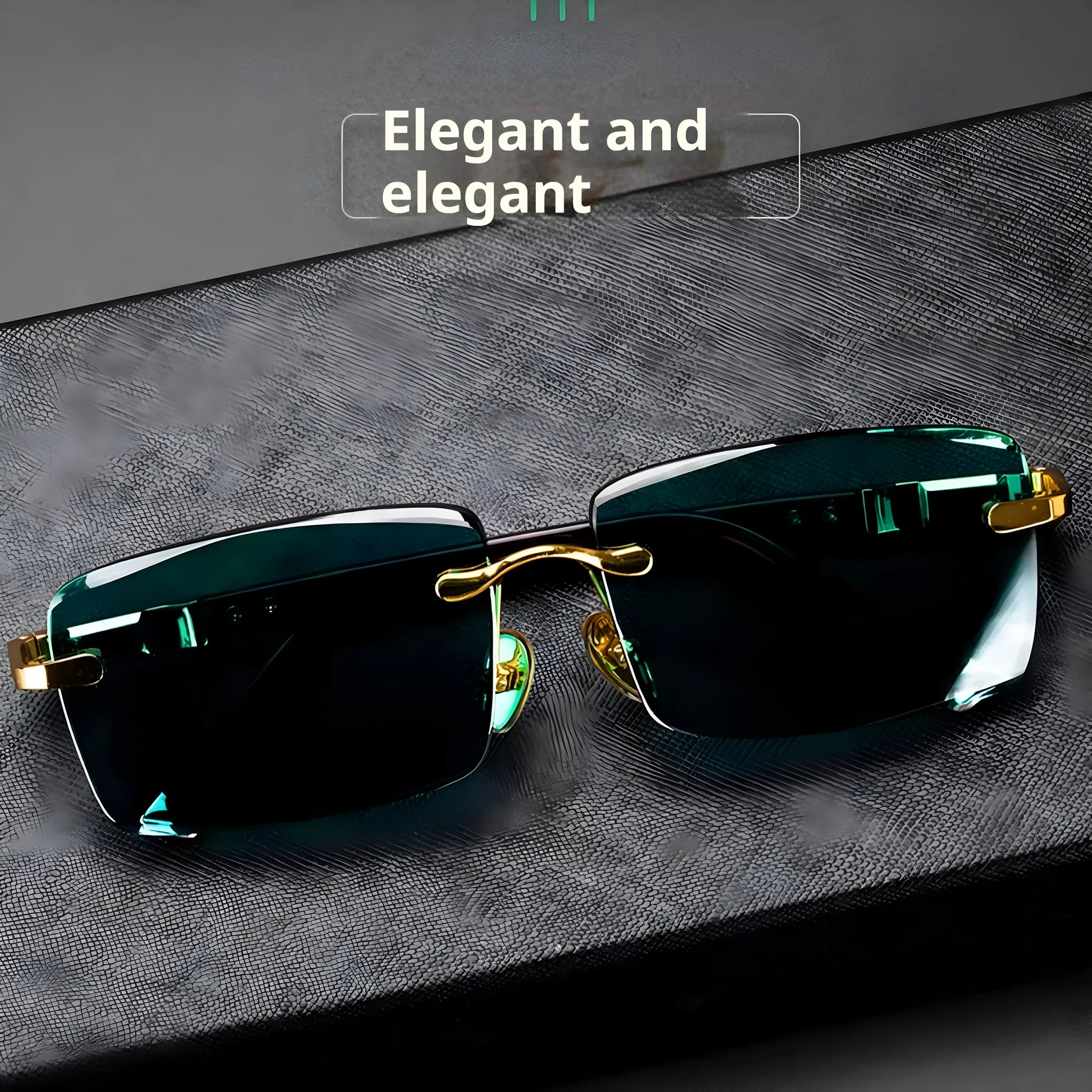A pair of frameless sunglasses with dark green crystal lenses, shown with a soft case and cleaning cloth.