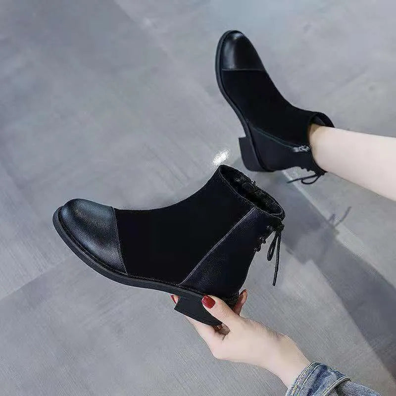Women's black soft leather Martin boots with side zip and round toe design