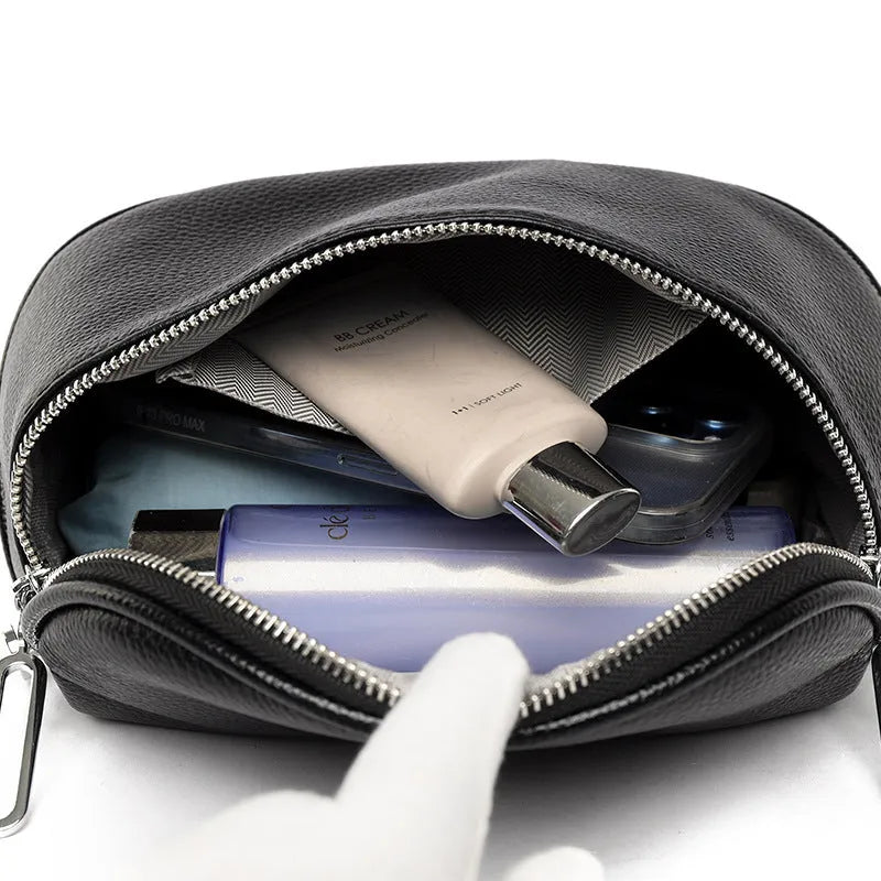 Women's soft PU leather messenger bag in saddle shape with single strap and zipper pocket
