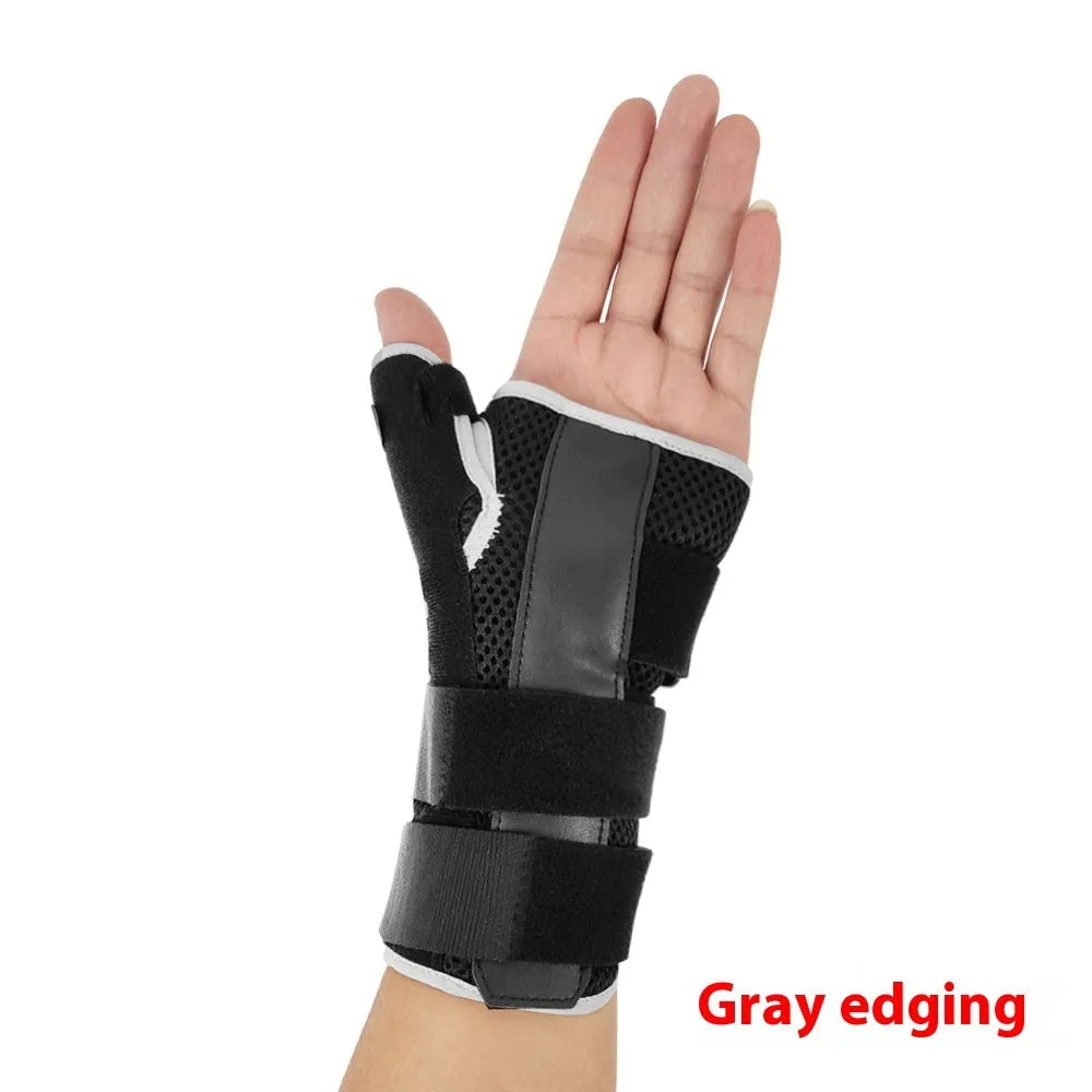 Black carbon fibre sports wrist guard with thumb strap and grey edging