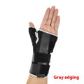 Black carbon fibre sports wrist guard with thumb strap and grey edging