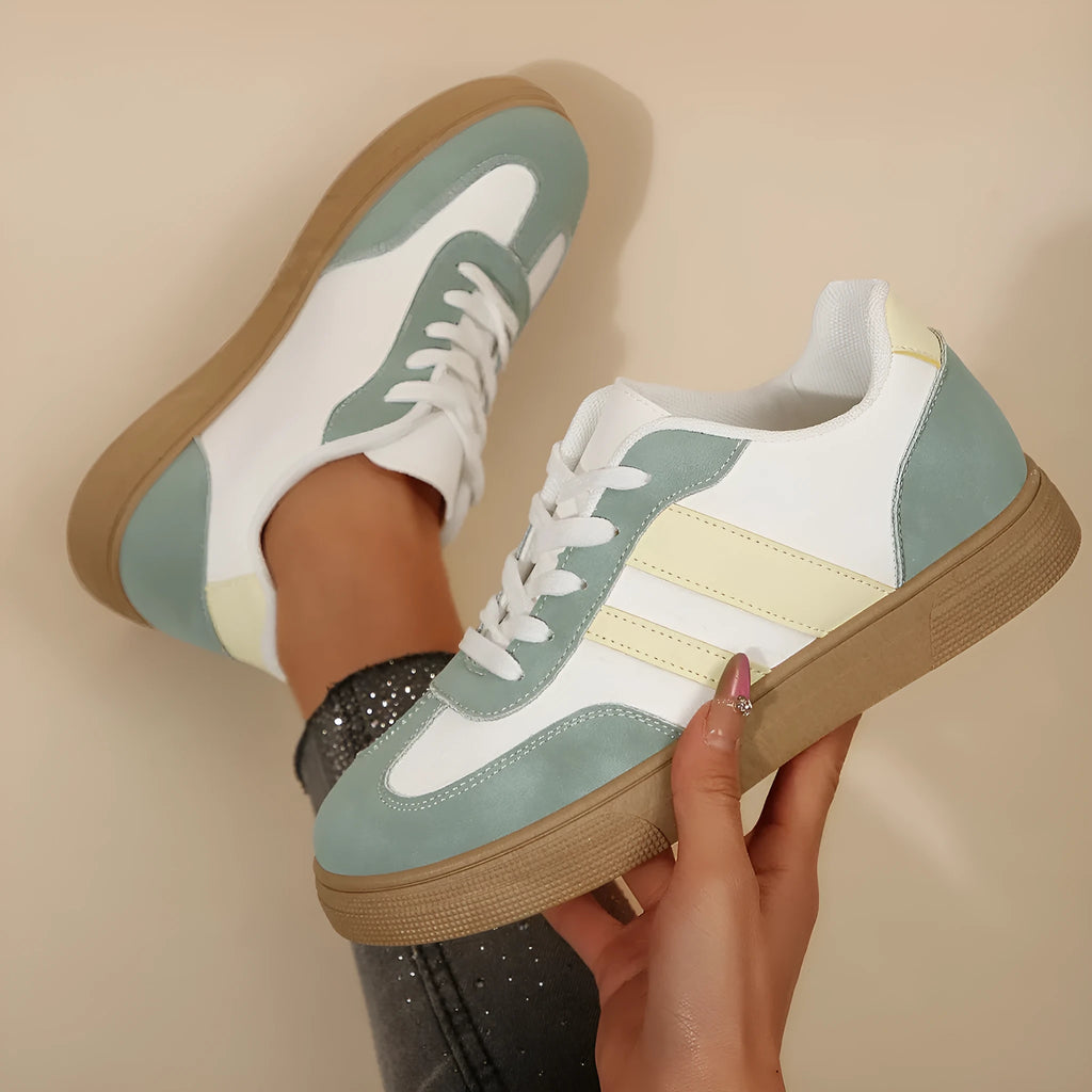 Green retro sports women's pumps with cross-strap design and round toe