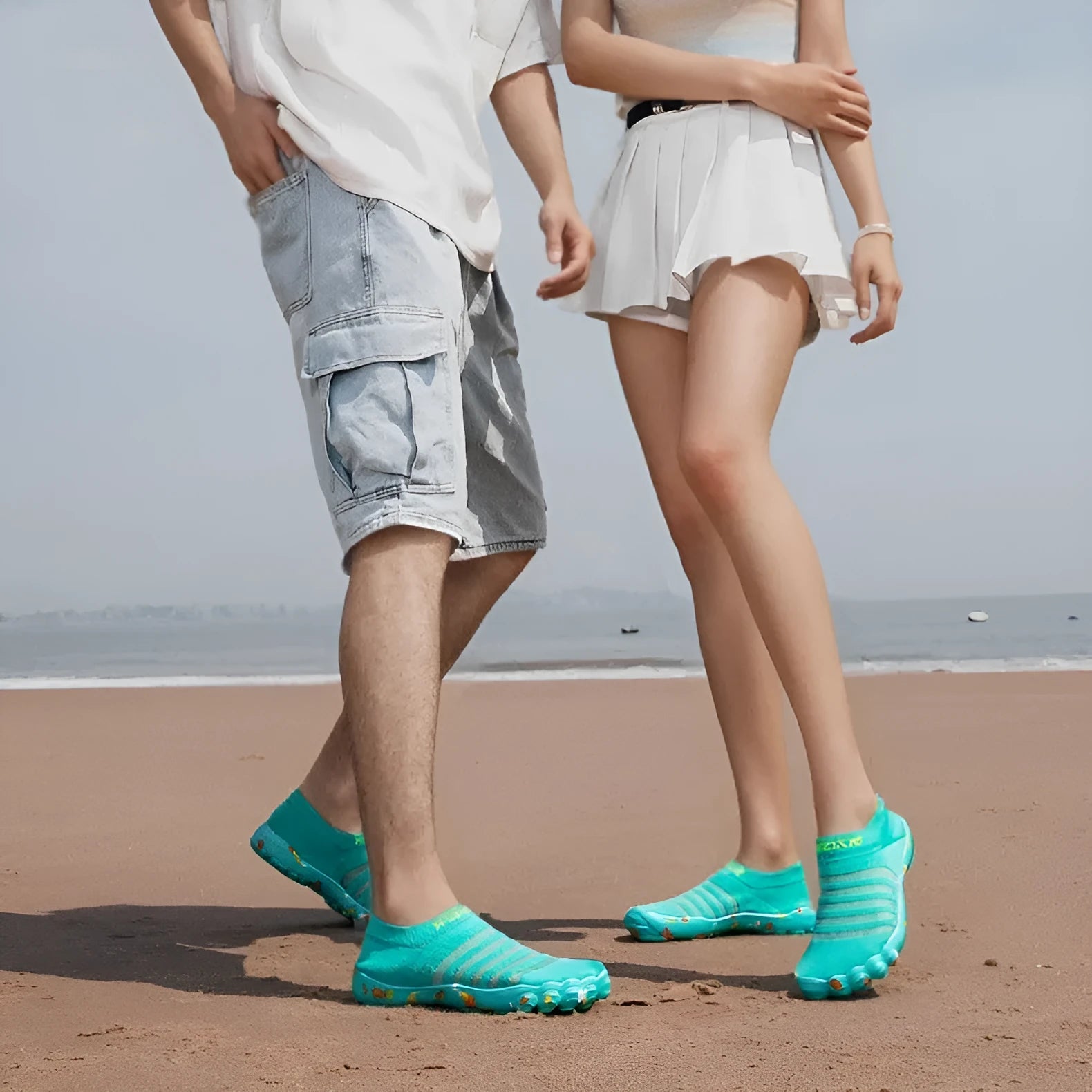 Women's camouflage Flyknit water shoes with lace-up front and rubber sole.