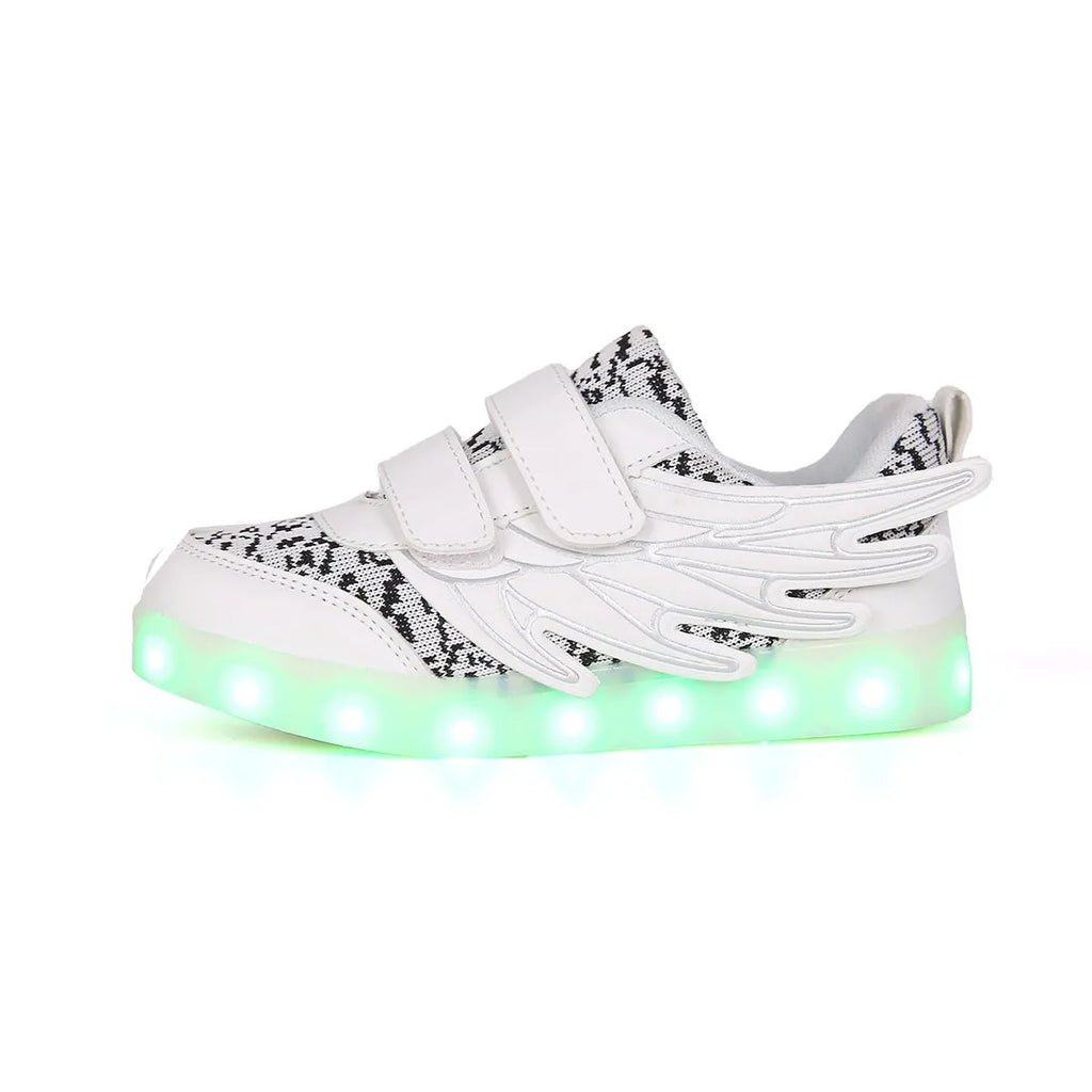 USB rechargeable children's LED light up trainers in plum red and white showing flashing soles.