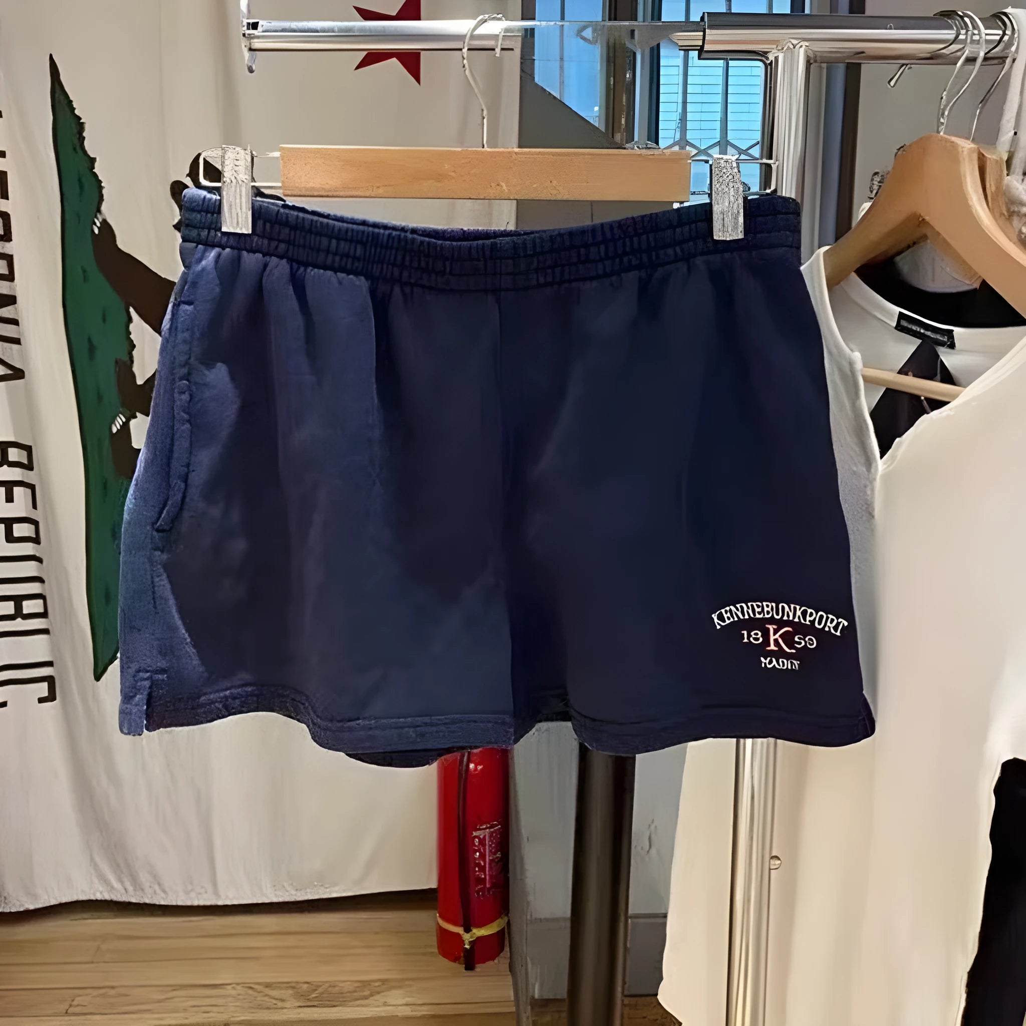 Dark blue and navy cotton sports shorts with white flag embroidery for women
