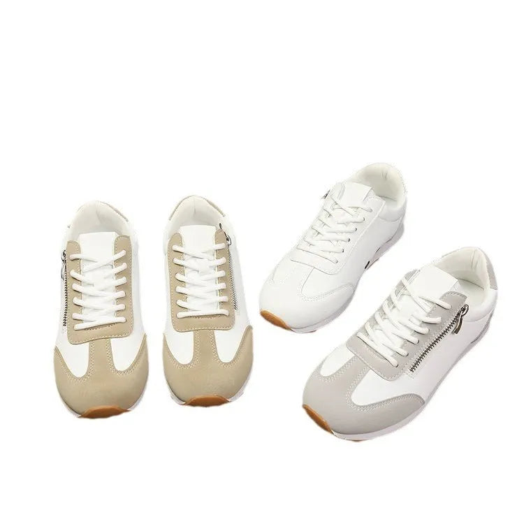 Women's flat-heeled shoes in artificial PU upper with rubber sole, shown in grey colour