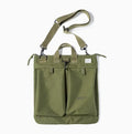 Canvas crossbody messenger bag in military green with shoulder strap and hard handle showing laptop compartment