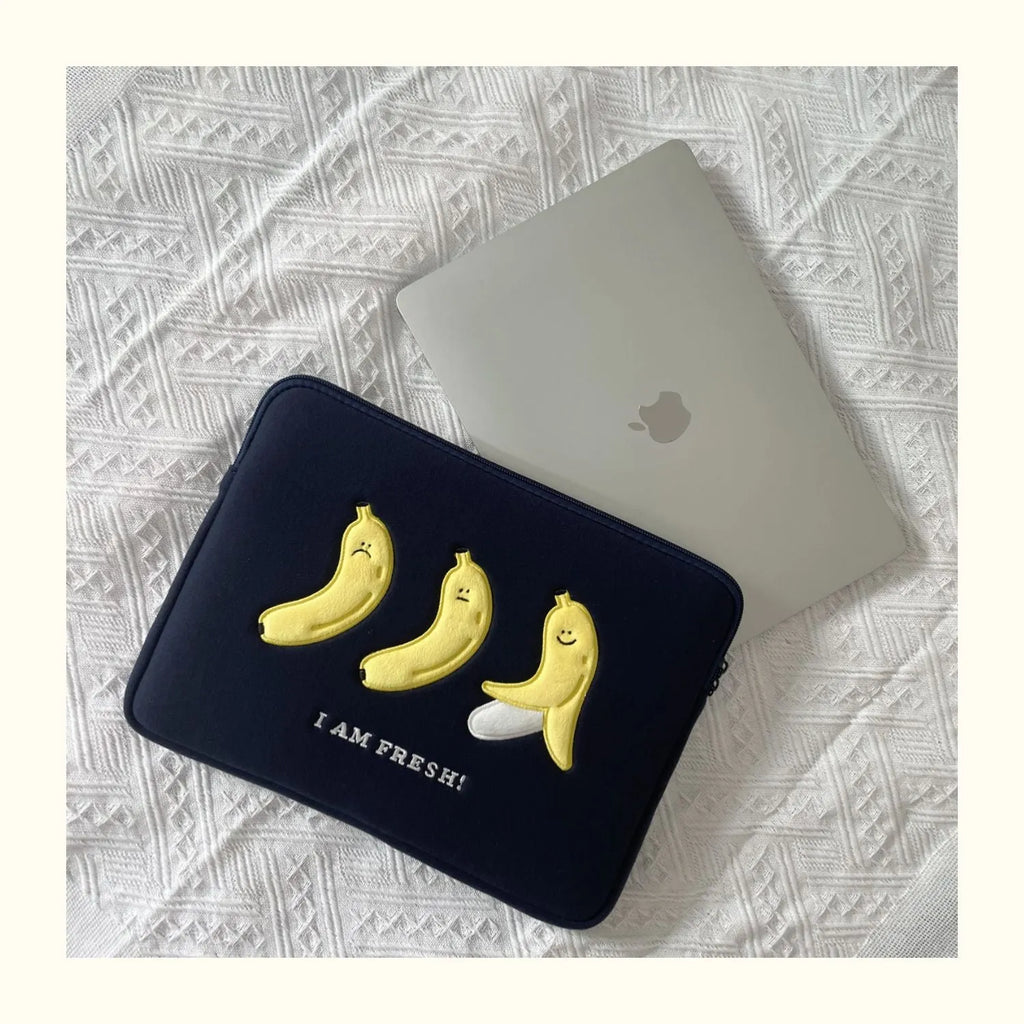 Embroidered animal pattern laptop sleeve in polyester fabric showing size options for 13.6, 14, and 15.6 inch laptops