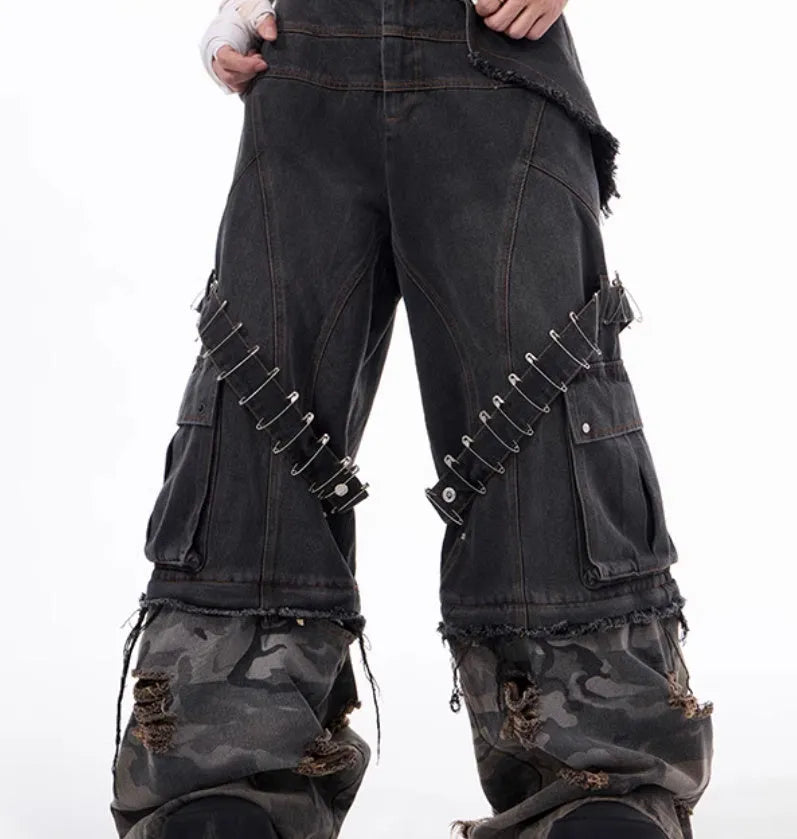 Men's grey camouflage jeans with splicing panels and ribbon detail on cotton denim.