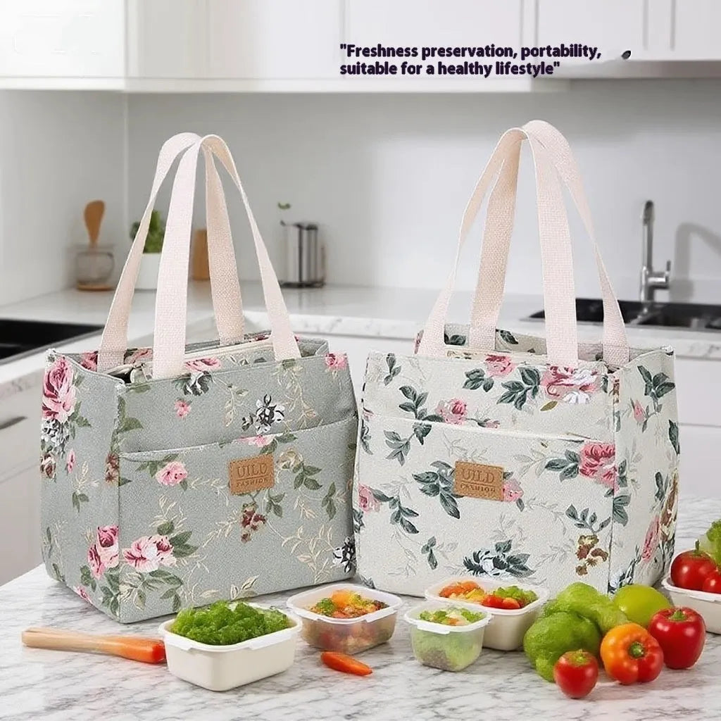 Women's portable square canvas bag with aluminium handle in a choice of printed designs including flowers and cats.