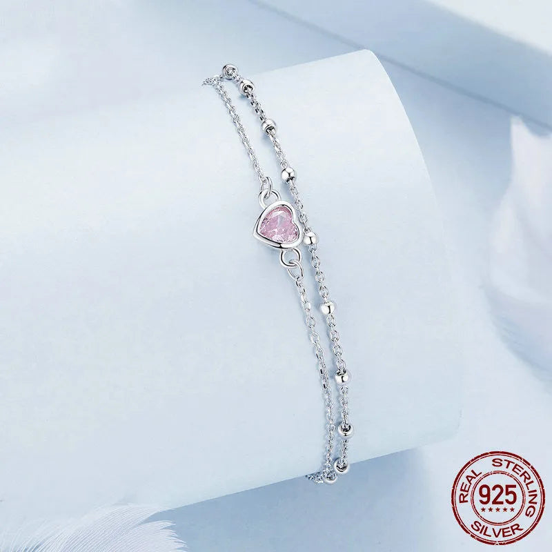 Women's sweet style 925 sterling silver bracelet with a small heart-shaped pendant on an adjustable chain.
