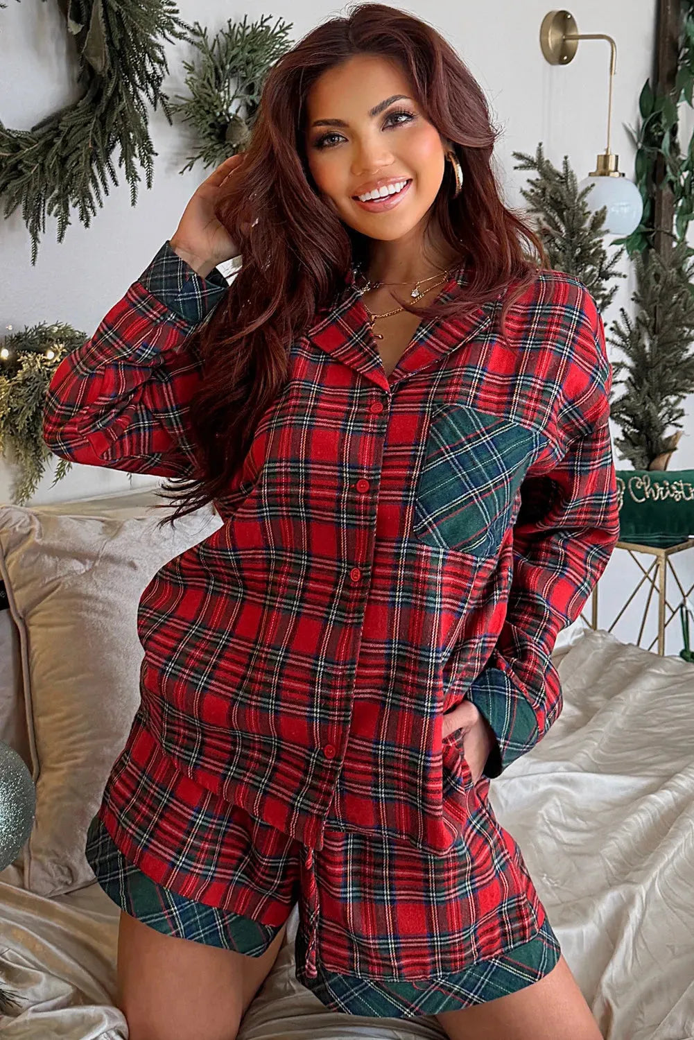 Red plaid Christmas pyjama set with contrast patches showing long sleeve shirt and matching shorts