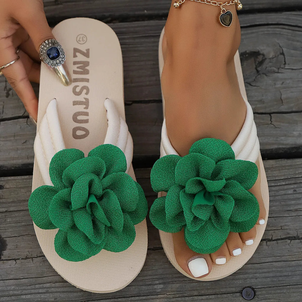 Green plus size floral slippers with round toe and PU sole on a white background.