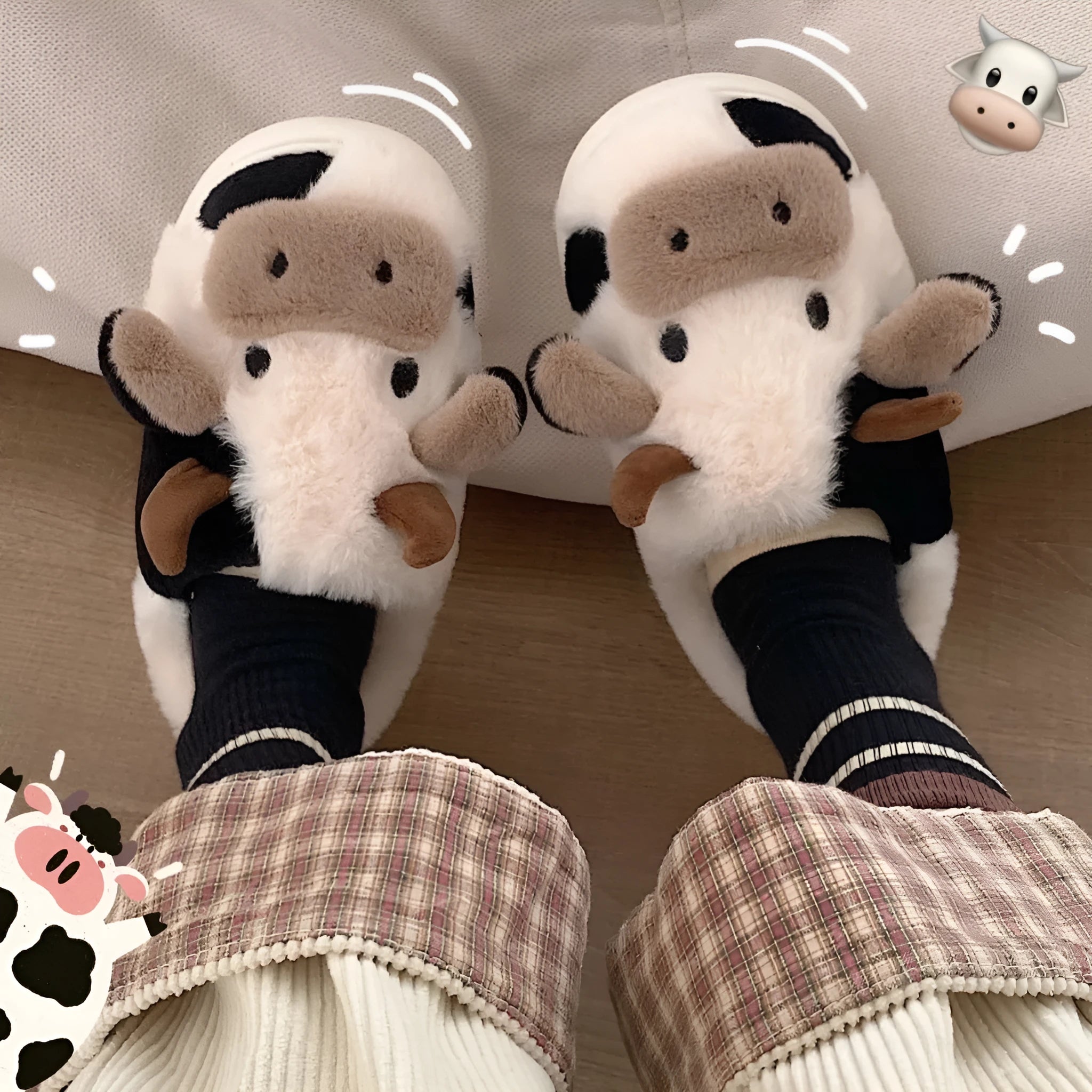 White cow-themed women's plush slippers with faux fur upper and textured non-slip sole