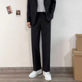 Plus size loose fit men's suit jacket and trousers set with white shirt and tie on a hanger