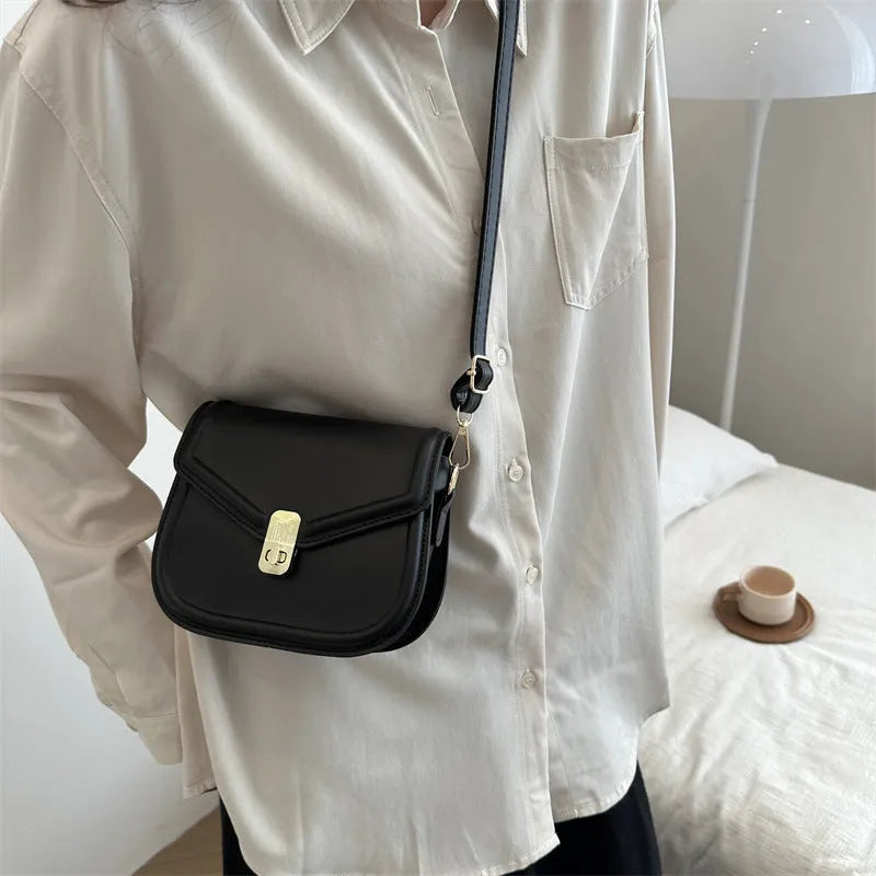 Soft PU clamshell messenger bag in horizontal square design shown in black colour