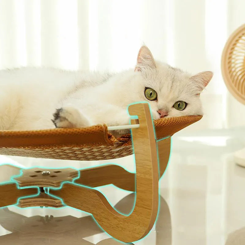 Brown woven rattan square pet hammock bed for cats and dogs, elevated off the ground.