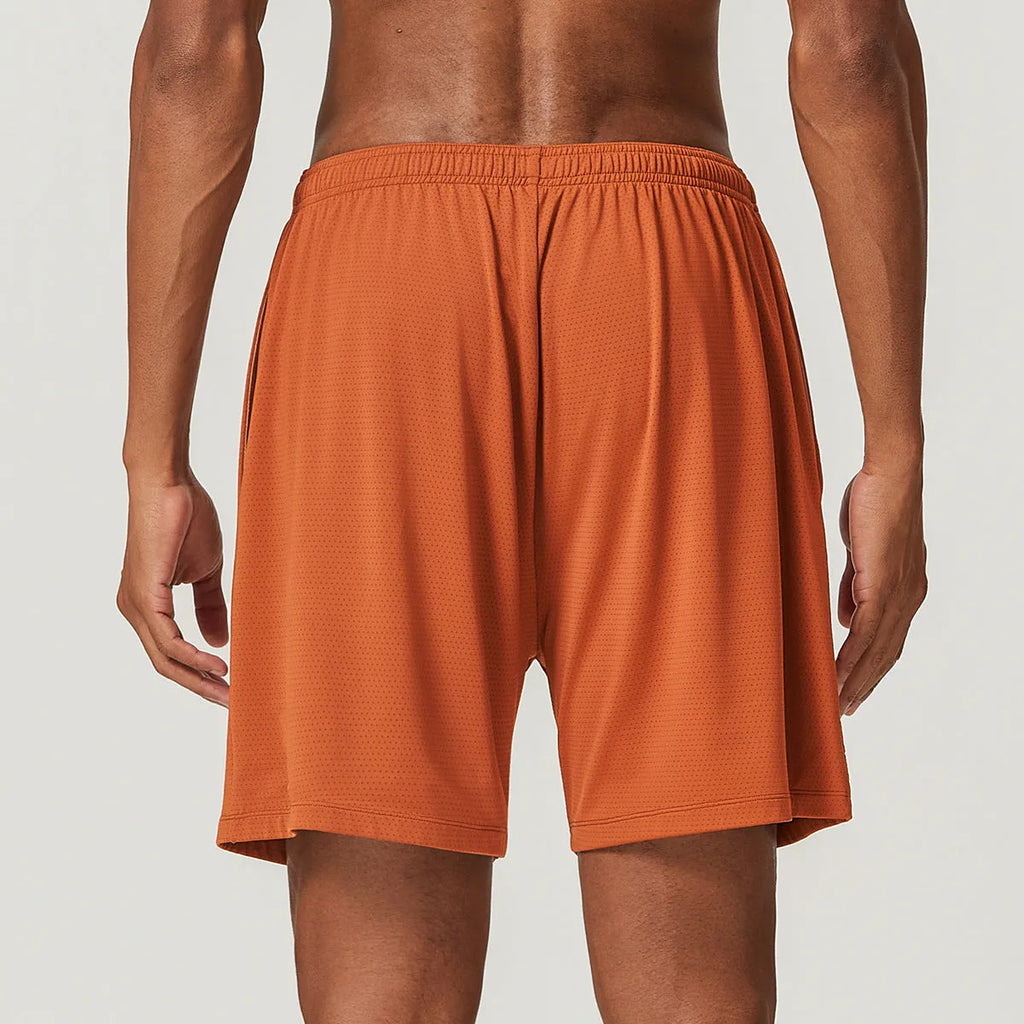 Men's quick-drying double-layer running shorts in khaki colour, showing mid-waist fit and shorts length.